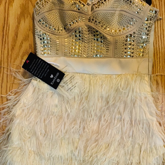 bebe Dresses & Skirts - Bebe’s woman’s festive dress Beige and gold